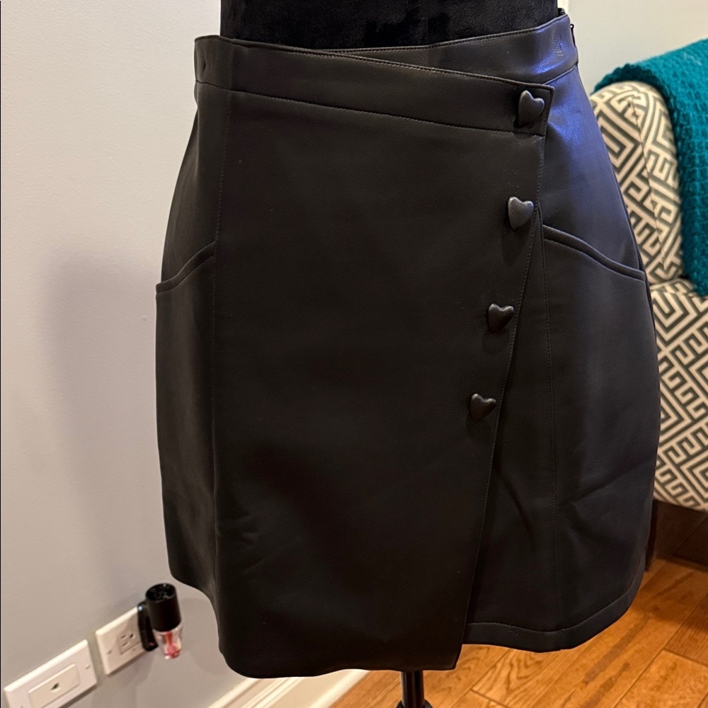 Avantlook Black faux leather skirt with heart detail